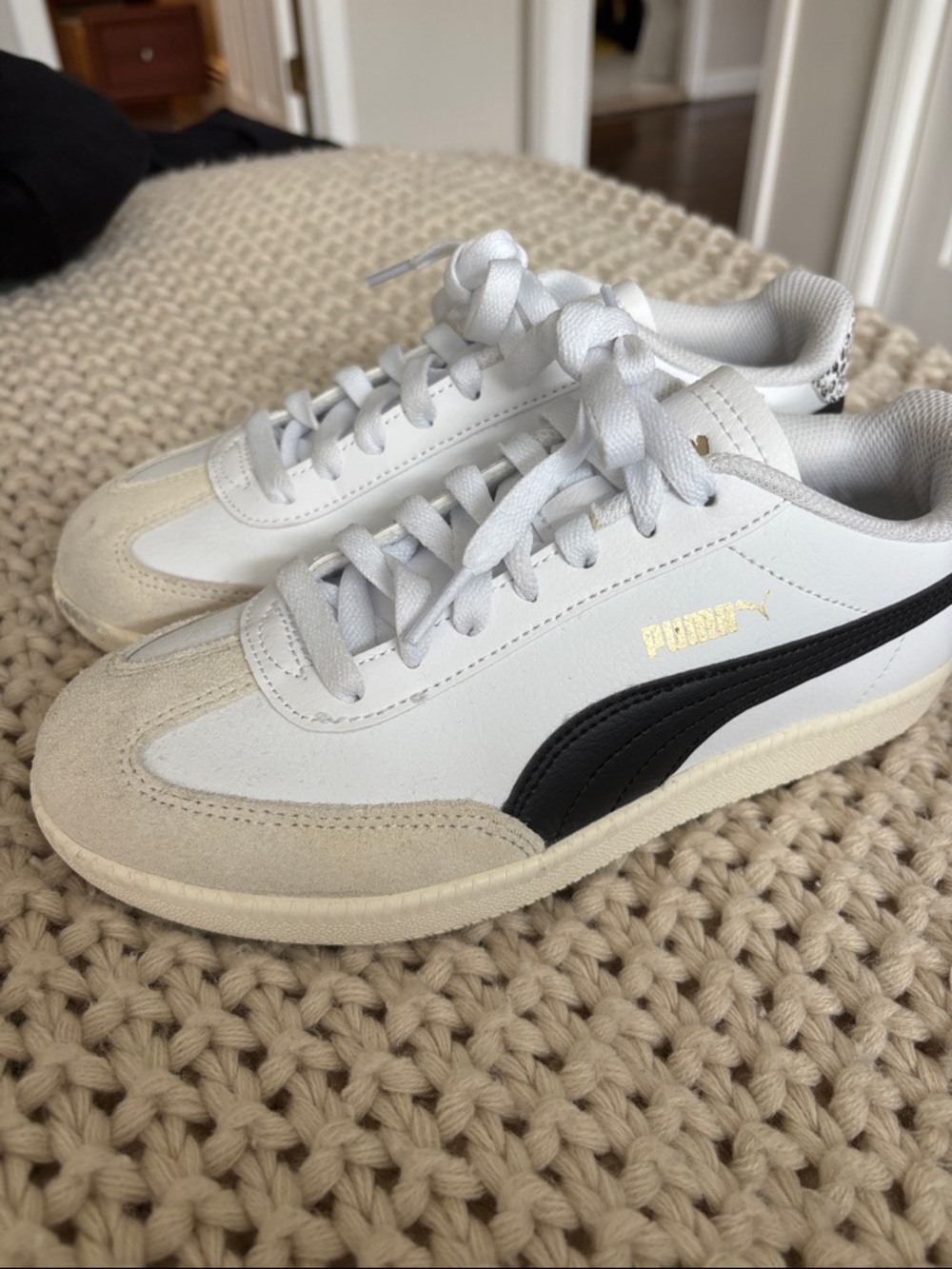 Puma Womens White Sneakers with Black Formstripe and Gold Logo